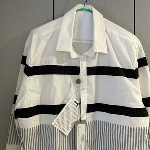 Long sleeve shirt with contrast panels.  Slim fit.  White with black